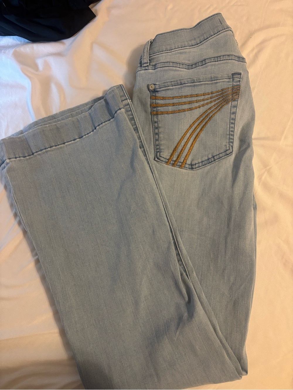7 For All Mankind Light Blue Boot Cut Jeans with Decorative Pocket Stitching